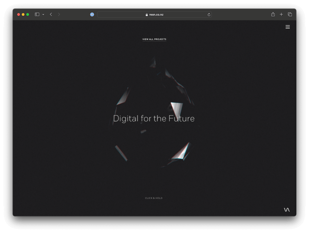 A minimalist dark website homepage with the text Digital for the Future centered over a geometric, faceted shape. At the top, View All Projects is displayed, and at the bottom, Click & Hold is visible.